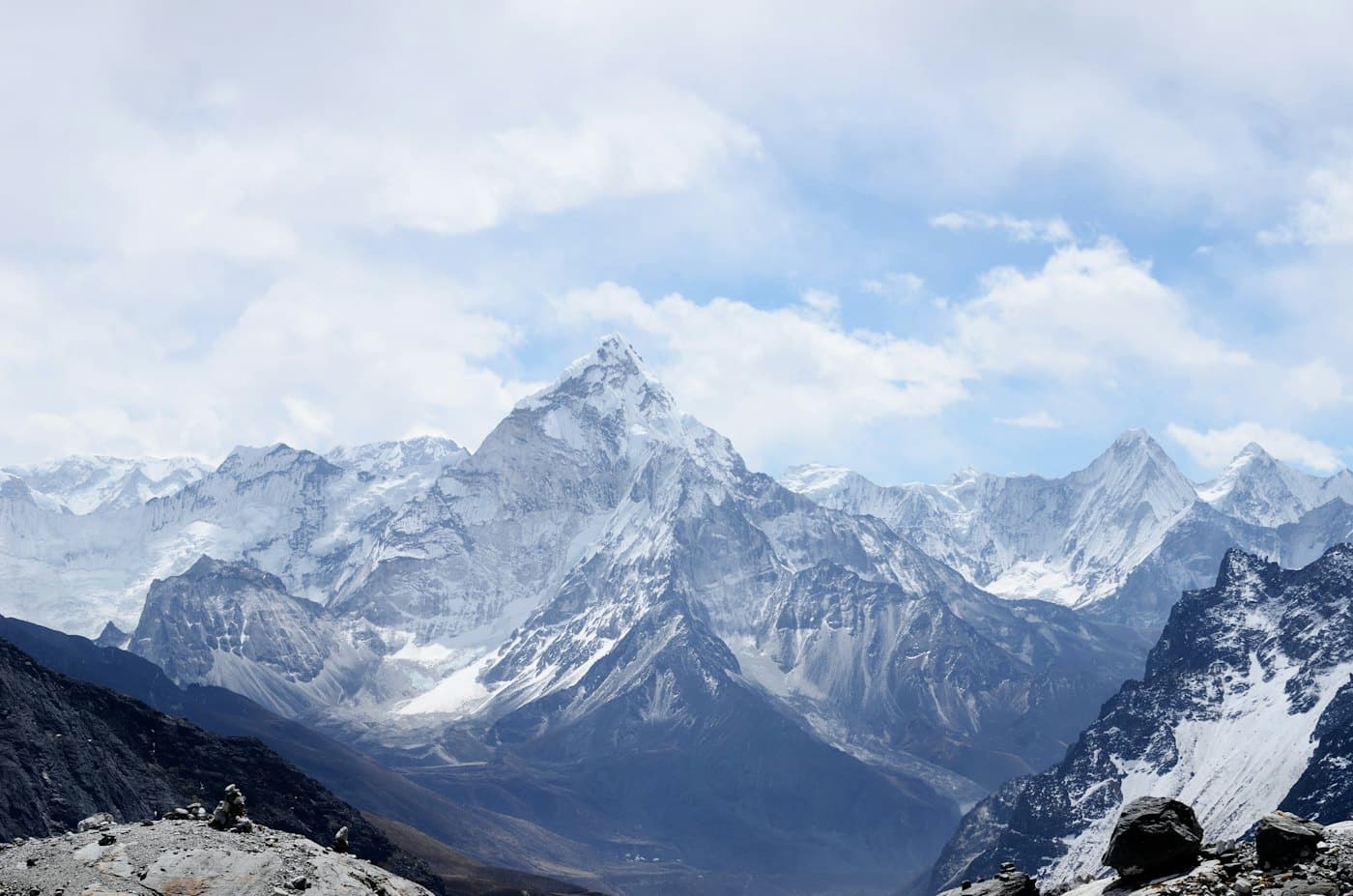 Snow-covered Ama Dablam rising above a mountain range in Nepal